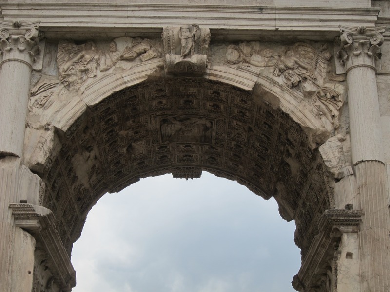 Arch for Titus, detail spandrels and keystone, northwestern facade
